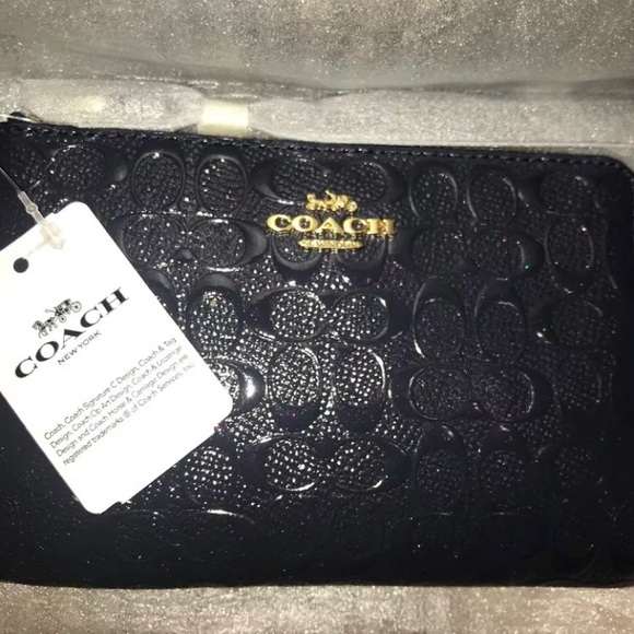 Coach Handbags - Coach corner zip navy blue wristlet